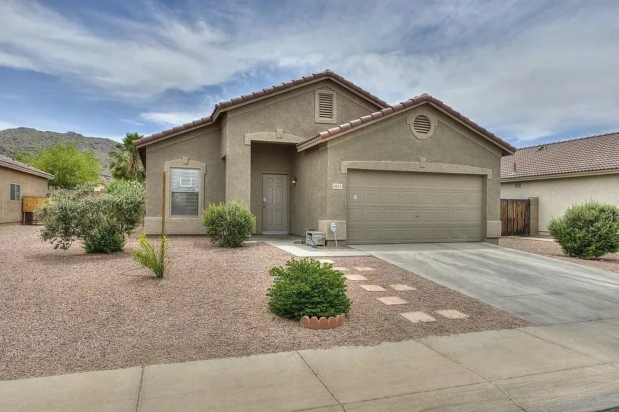 Two-tone exterior repaint — before