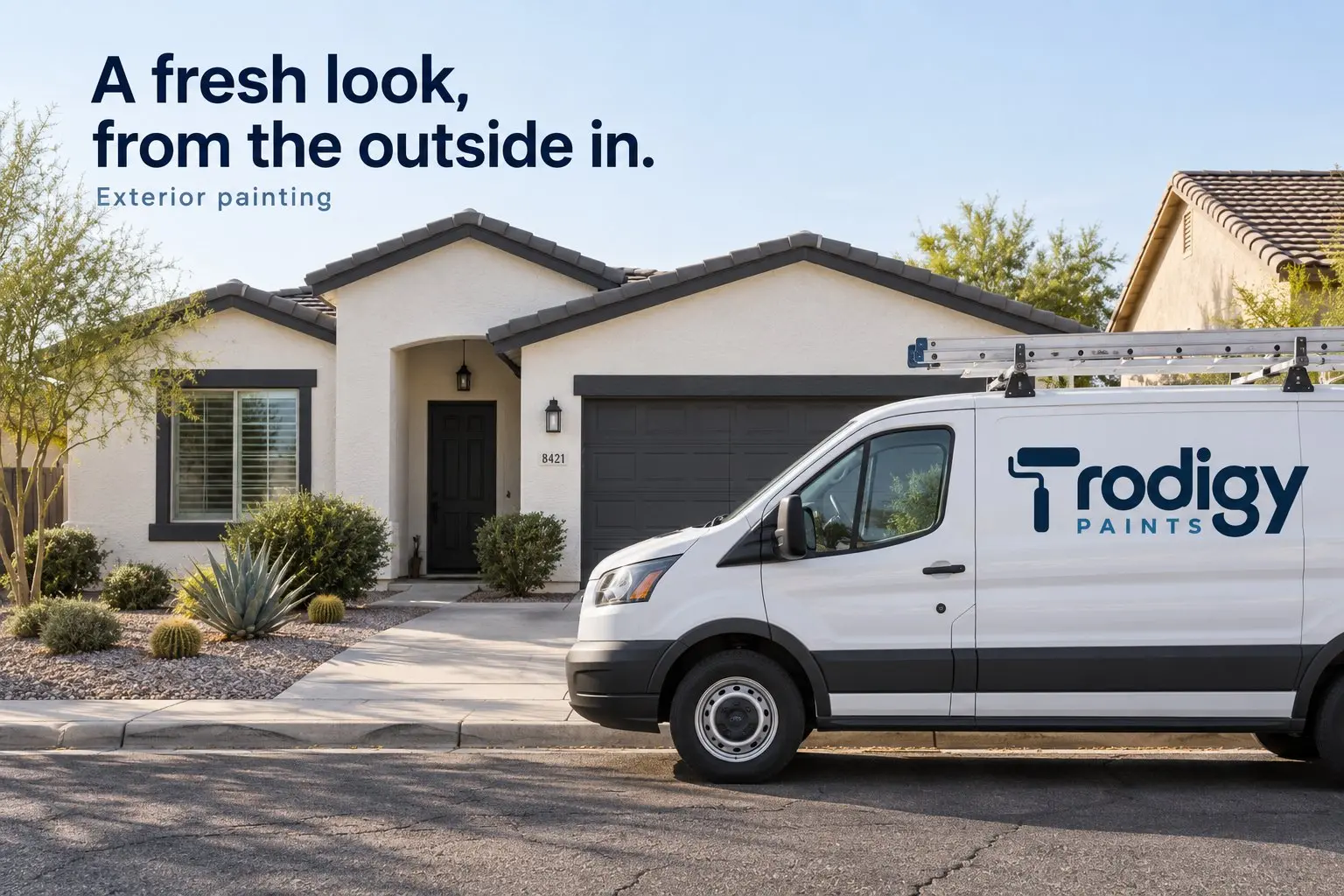 Prodigy Paints van in front of a freshly painted home